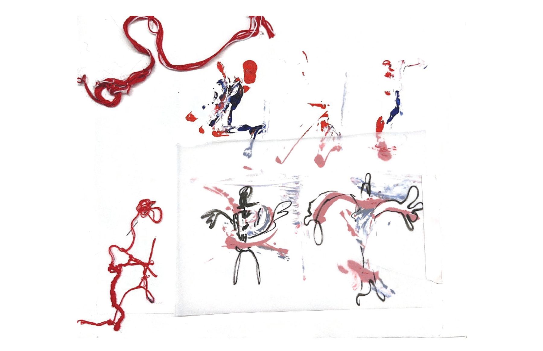 Red thread and figure sketches on a white page
